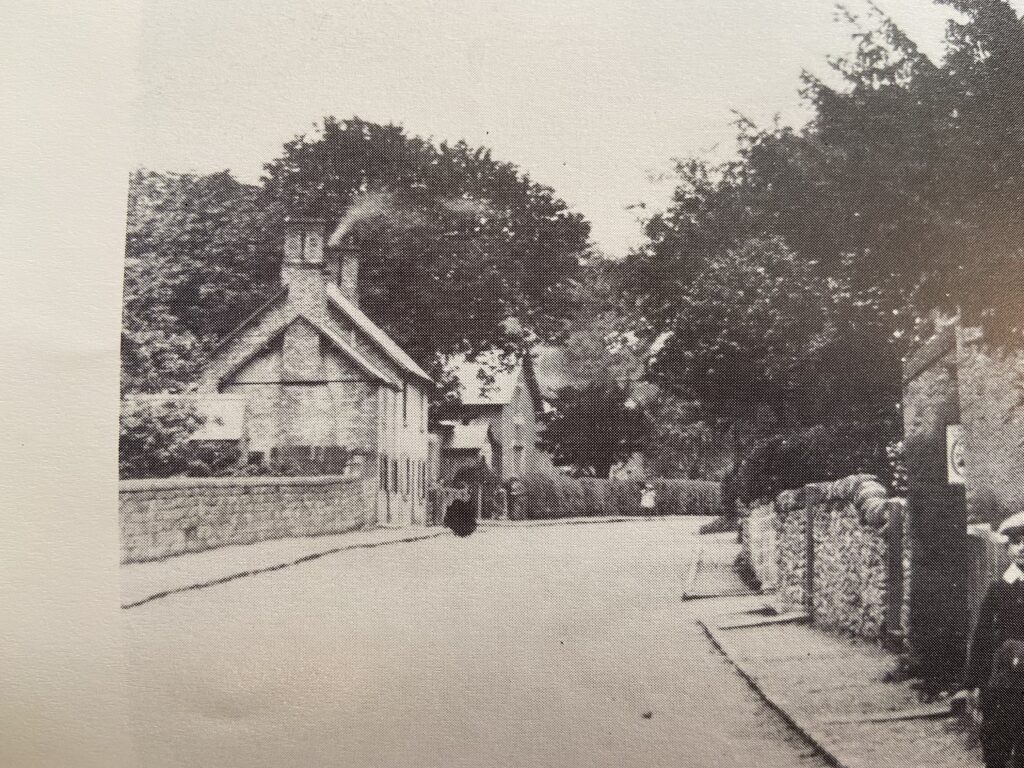 Old photograph of houses on an English street